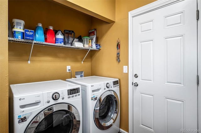 laundry area with separate washer and dryer