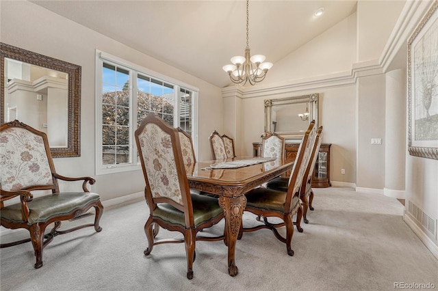 carpeted dining area with high vaulted ceiling and a notable chandelier