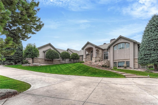 view of front of home with a front yard