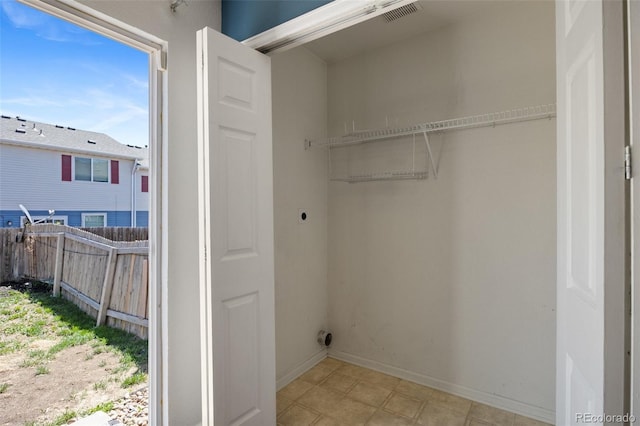11050 Gaylord St, Northglenn, CO 80233 - laundry area featuring electric dryer hookup and baseboards