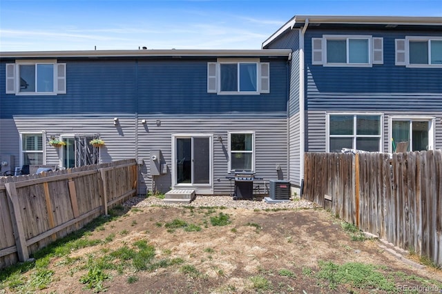 11050 Gaylord St, Northglenn, CO 80233 - back of house featuring a fenced backyard and cooling unit