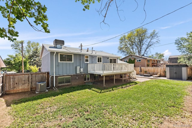 4381 Dixon Dr, Westminster, CO 80031 - back of house featuring board and batten siding, a deck, and central air condition unit