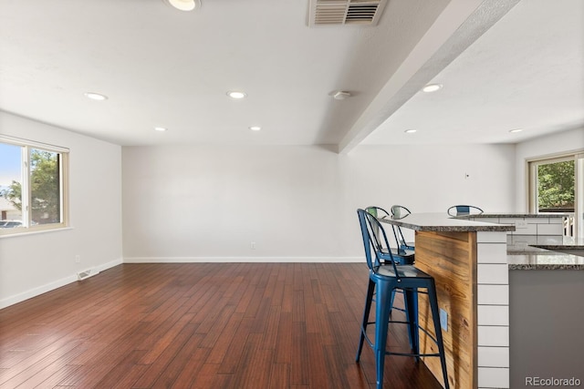 4381 Dixon Dr, Westminster, CO 80031 - bar featuring dark wood-type flooring, recessed lighting, and baseboards