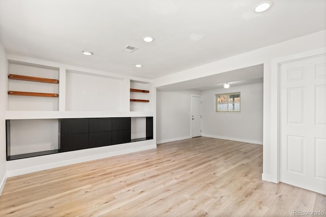4381 Dixon Dr, Westminster, CO 80031 - unfurnished living room featuring recessed lighting, light wood finished floors, and baseboards