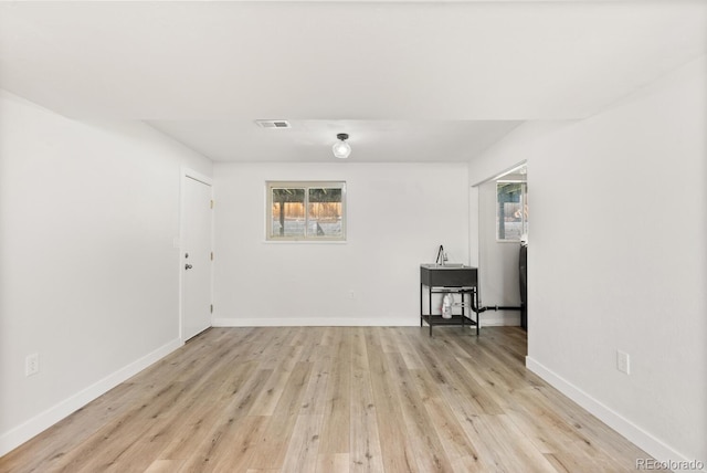 4381 Dixon Dr, Westminster, CO 80031 - empty room featuring light wood-style flooring and baseboards
