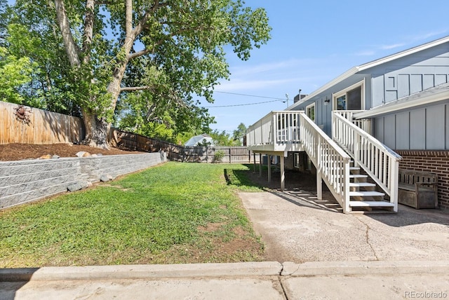 4381 Dixon Dr, Westminster, CO 80031 - view of yard with stairs and a deck