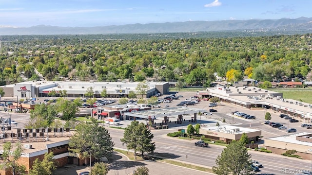 4381 Dixon Dr, Westminster, CO 80031 - bird's eye view of a mountain backdrop and a heavily wooded area