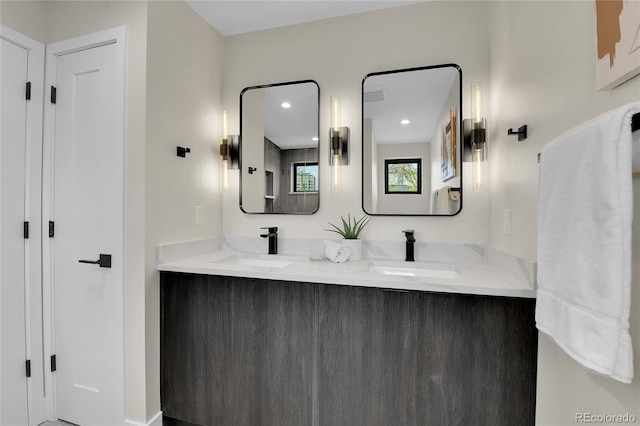 2162 S Ash St, Denver, CO 80222 - full bathroom with double vanity and recessed lighting