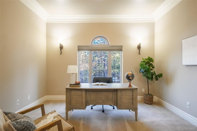 office space featuring crown molding, light colored carpet, and baseboards