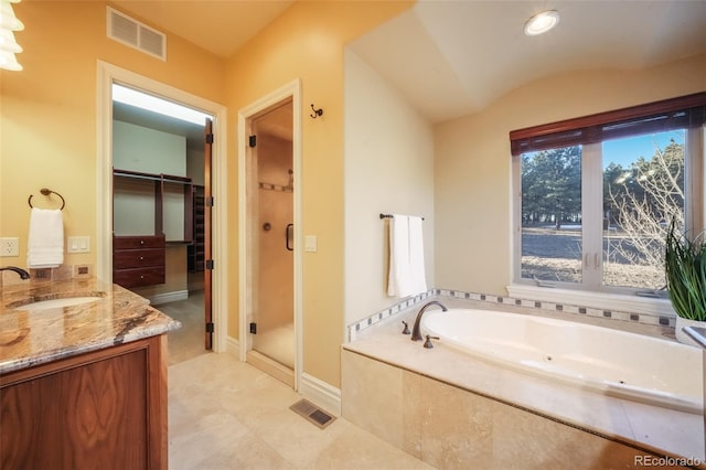 full bath with a stall shower, visible vents, vanity, and a tub with jets