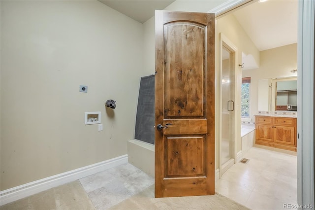 full bath featuring a shower stall, vanity, and baseboards