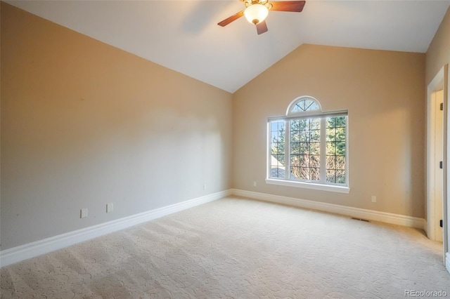 unfurnished room with visible vents, light carpet, vaulted ceiling, ceiling fan, and baseboards