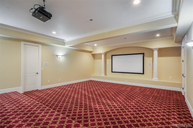 carpeted cinema room with recessed lighting, crown molding, visible vents, baseboards, and ornate columns