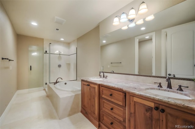 full bath with a garden tub, a stall shower, a sink, and tile patterned floors