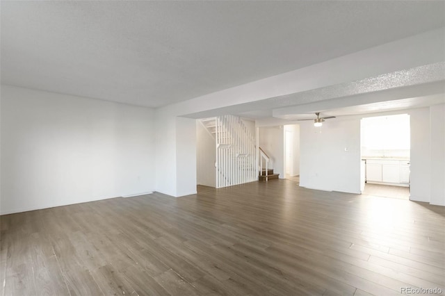 spare room featuring hardwood / wood-style flooring and ceiling fan