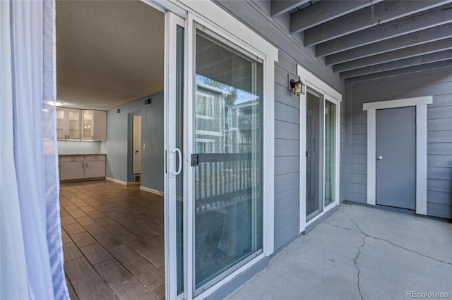 balcony featuring a patio area