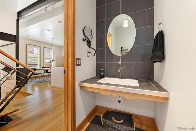 bathroom featuring wood finished floors