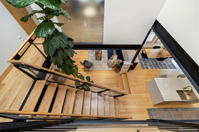 interior space featuring baseboards and wood finished floors