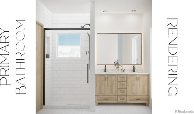 bathroom with double vanity, a stall shower, and a sink