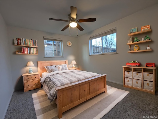 bedroom featuring carpet, a ceiling fan, and baseboards
