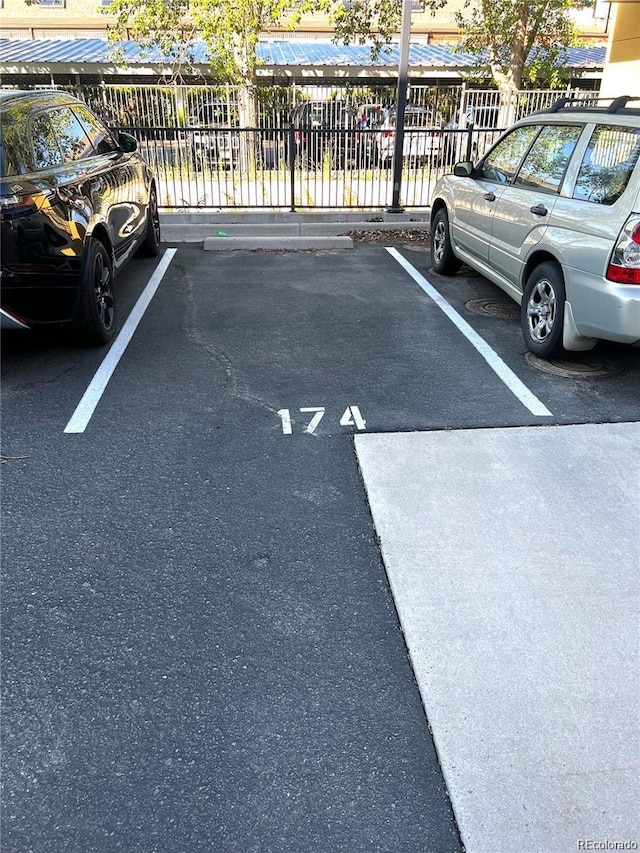 3195 Blake St Unit 106, Denver, CO 80205 - view of uncovered parking lot