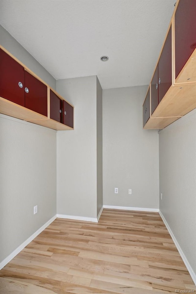 3195 Blake St Unit 106, Denver, CO 80205 - basement featuring light wood-style flooring, baseboards, and recessed lighting
