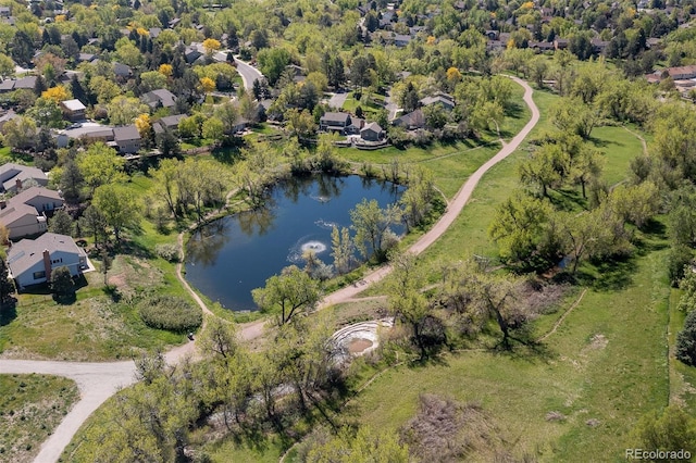 birds eye view of property featuring a water view and a residential view