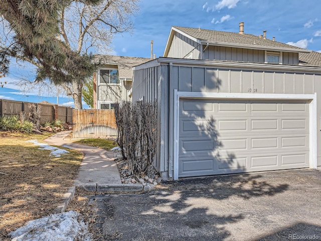 garage with fence