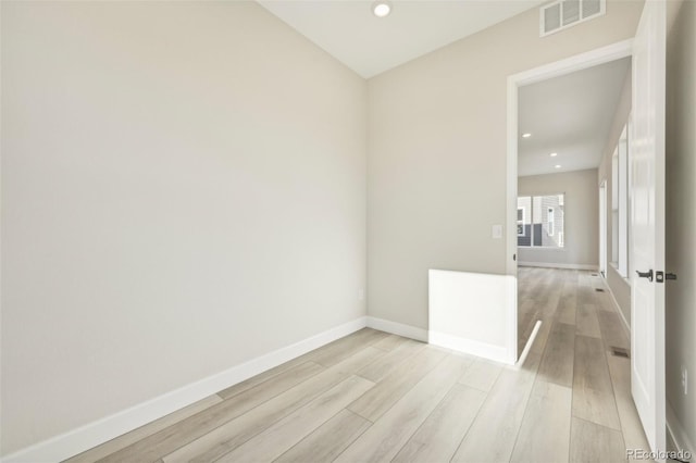 empty room featuring light hardwood / wood-style floors