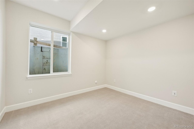 empty room with carpet flooring