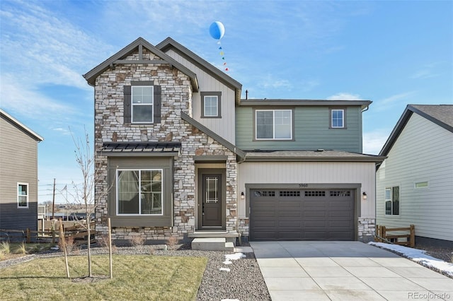 view of front of property featuring a garage and a front yard