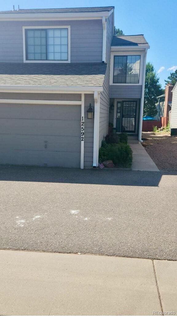 view of front of house with a garage