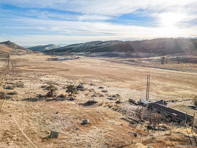 property view of mountains featuring a rural view