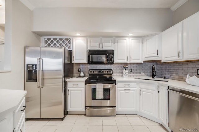 601 W 11th Ave Unit 1101, Denver, CO 80204 - kitchen with appliances with stainless steel finishes, a sink, light countertops, and backsplash