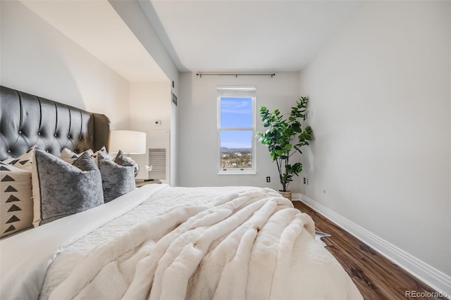 601 W 11th Ave Unit 1101, Denver, CO 80204 - bedroom with dark wood finished floors and baseboards