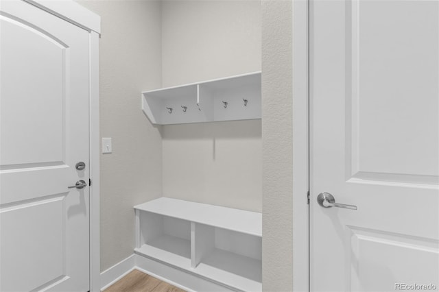 21202 E 63rd Dr, Aurora, CO 80019 - mudroom with baseboards and wood finished floors