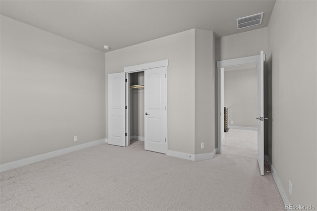 21202 E 63rd Dr, Aurora, CO 80019 - unfurnished bedroom with light colored carpet, baseboards, visible vents, and a closet