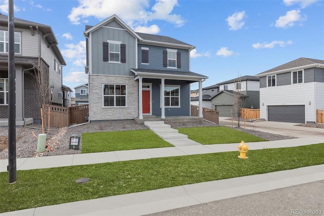 21202 E 63rd Dr, Aurora, CO 80019 - view of front facade featuring board and batten siding, a porch, a front yard, fence, and stone siding