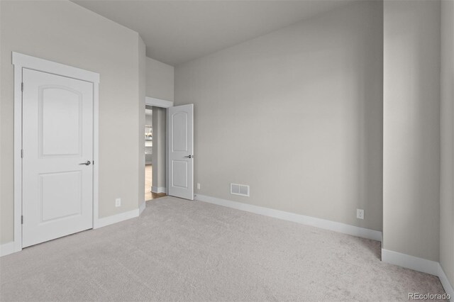 21202 E 63rd Dr, Aurora, CO 80019 - unfurnished bedroom featuring carpet floors, baseboards, and visible vents