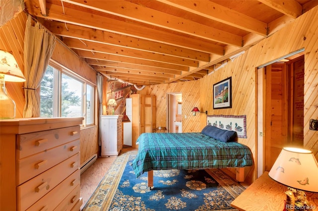 902 Hawk Way, Jefferson, CO 80456 - bedroom with a baseboard radiator, wood walls, beamed ceiling, and light wood-style floors