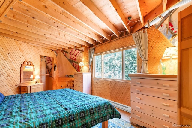 902 Hawk Way, Jefferson, CO 80456 - bedroom with wooden walls and baseboard heating