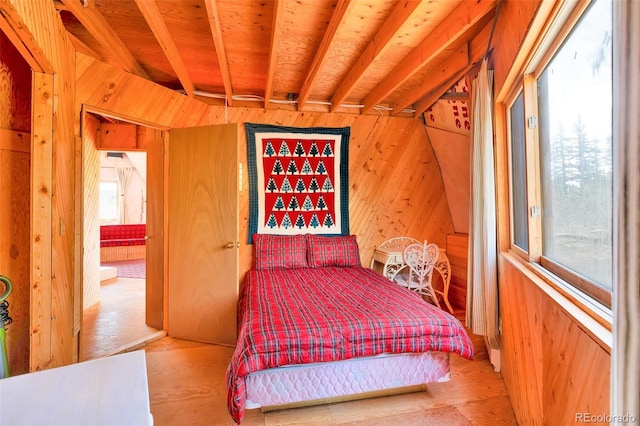 902 Hawk Way, Jefferson, CO 80456 - bedroom with wooden walls and wood finished floors