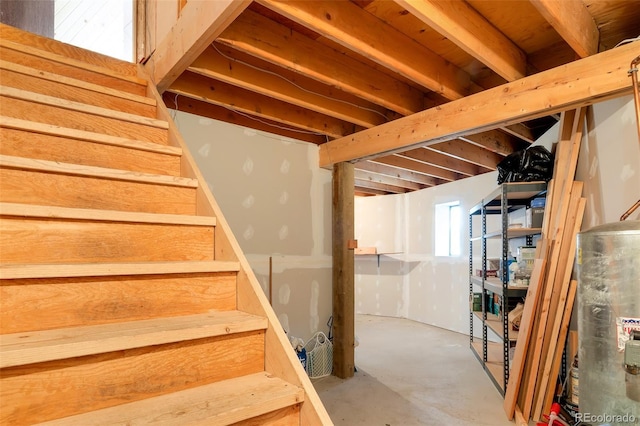 902 Hawk Way, Jefferson, CO 80456 - staircase with water heater and concrete floors