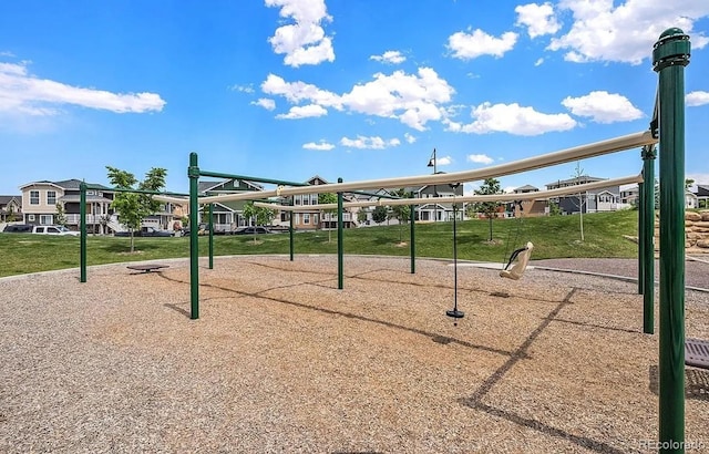 surrounding community featuring a residential view, playground community, and a yard