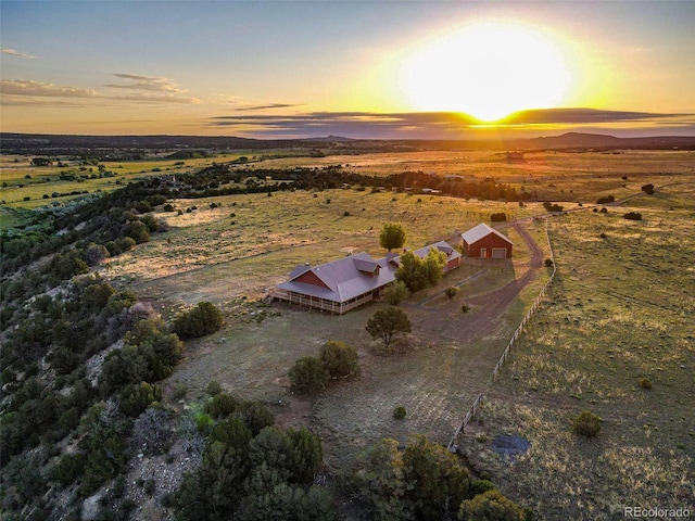 aerial view at dusk with a rural view