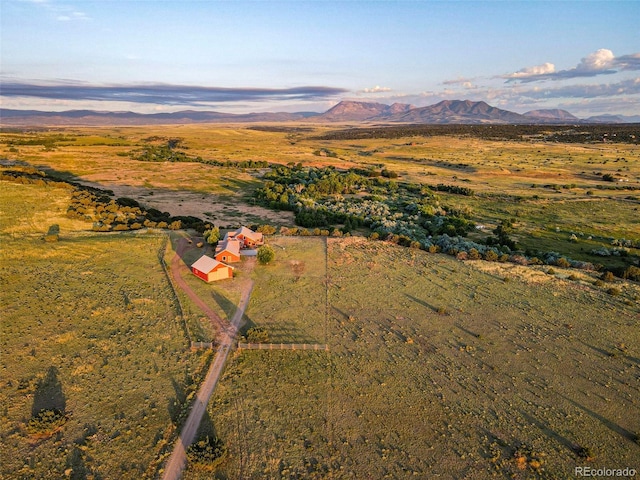 aerial view featuring a mountain view and a rural view