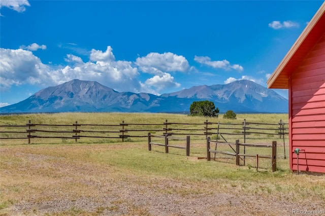 mountain view featuring a rural view