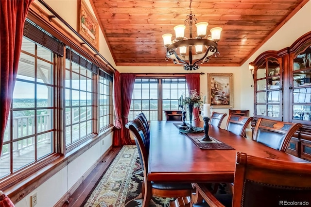 dining area with vaulted ceiling, an inviting chandelier, a wealth of natural light, wooden ceiling, and wood-type flooring