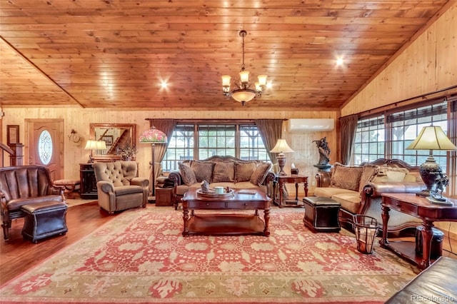 living room featuring wood ceiling, an AC wall unit, hardwood / wood-style flooring, and a notable chandelier