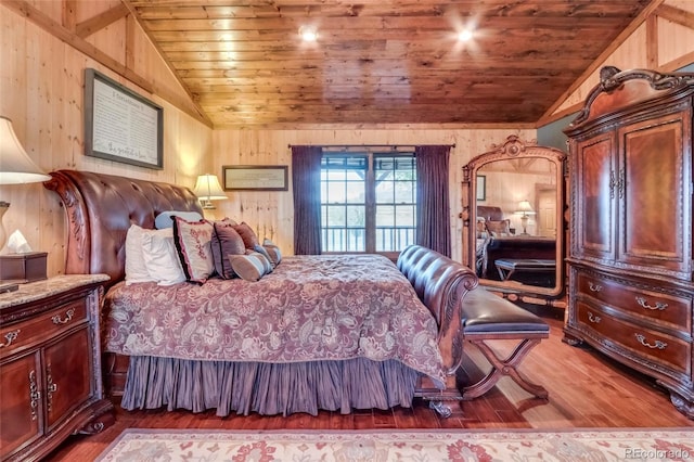 bedroom featuring lofted ceiling, wooden ceiling, wooden walls, and wood-type flooring